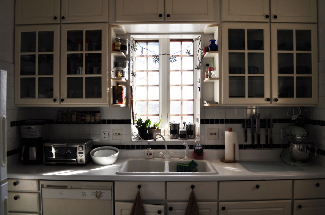 Small kitchen, charm, cabinets, window cabinets, small space, white cabinet