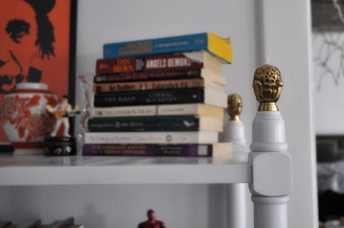 Etagere, white, brass accent, book shelf, shelf decor, shelf style, Einstein